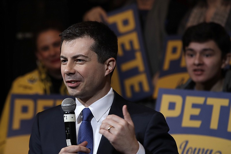 Photo by Gene J. Puskar of The Associated Press/ Democratic presidential candidate former South Bend, Indiana, Mayor Pete Buttigieg, speaks at a town hall meeting at the Orpheum Theatre in Sioux City, Iowa, on Friday, Jan. 31, 2020.