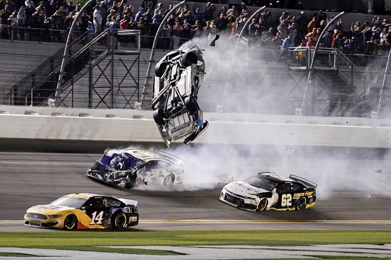 AP photo by Terry Renna / Ryan Newman's car goes airborne after being hit by Corey LaJoie, underneath, on the final lap of the Daytona 500 on Monday at Daytona International Speedway in Daytona Beach, Fla.