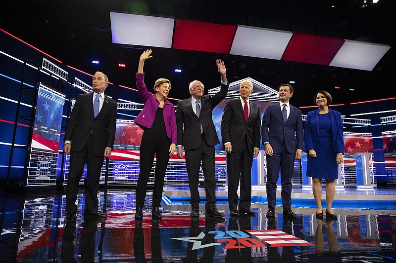 Candidates take the stage during the Democratic presidential debate at the Paris Theater in Las Vegas, on Wednesday, Feb. 19, 2020. From left: Michael Bloomberg; Sen. Elizabeth Warren (D-Mass.); Sen. Bernie Sanders (I-Vt.); former Vice President Joe Biden; Pete Buttigieg and Sen. Amy Klobuchar (D-Minn.). Warren’s strong performance helped her raise $2.8 million by night’s end, but the question was whether it was too late to help her campaign. (Calla Kessler/The New York Times)