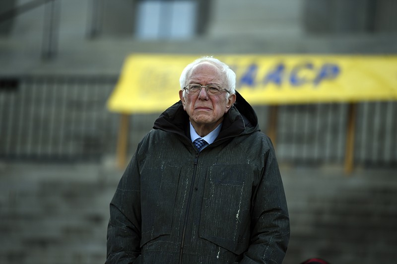 Democratic presidential candidate Sen. Bernie Sanders, I-Vt., stands at the South Carolina Statehouse before a Dr. Martin Luther King Jr. Day rally Monday, Jan. 20, 2020, in Columbia, S.C. (AP Photo/Meg Kinnard)