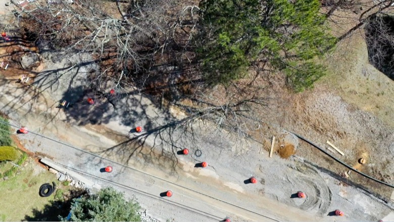 Photo Provided Courtesy of 148 Films by Skip Skipper / This aerial photograph shows a cluster of homes in an area along the 1300 block of Sunset Drive on Signal Mountain where Emergency Management officials say a shifting shelf has endangered the structural integrity of at least one home.