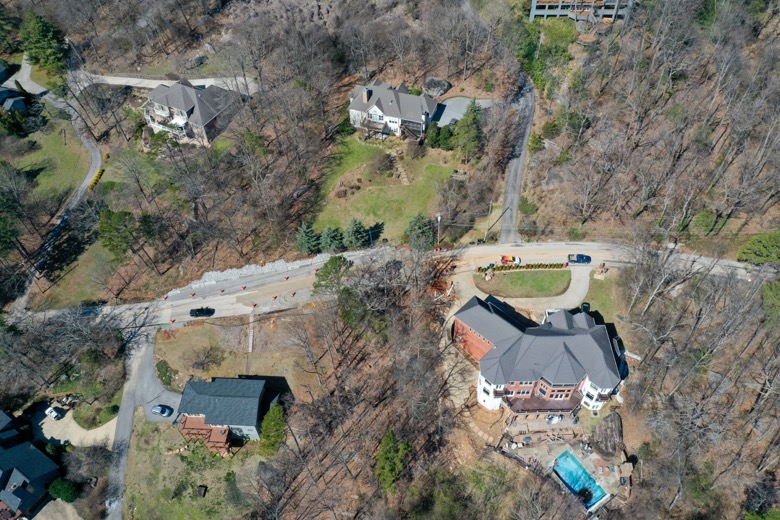 Photo Provided Courtesy of 148 Films by Skip Skipper / This aerial photograph shows a cluster of homes in an area along the 1300 block of Sunset Drive on Signal Mountain where Emergency Management officials say a shifting shelf has endangered the structural integrity of at least one home.