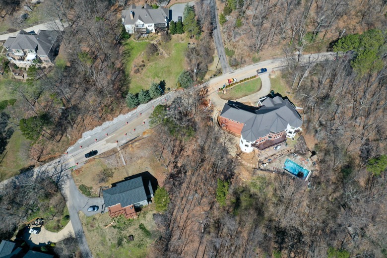 Photo Provided Courtesy of 148 Films by Skip Skipper / This aerial photograph shows a cluster of homes in an area along the 1300 block of Sunset Drive on Signal Mountain where Emergency Management officials say a shifting shelf has endangered the structural integrity of at least one home.