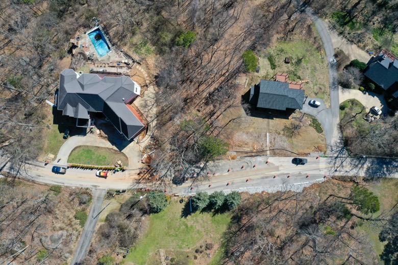 Photo Provided Courtesy of 148 Films by Skip Skipper / This aerial photograph shows a cluster of homes in an area along the 1300 block of Sunset Drive on Signal Mountain where Emergency Management officials say a shifting shelf has endangered the structural integrity of at least one home.