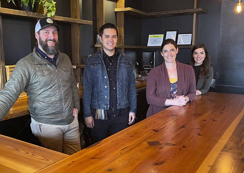 Photo by Barry Courter / Opening in the old 2 Sons space on MLK, Proof is the brainchild of Michael Robinson, left, and Mia Littilejohn, third from left. Toby Darling, second from left, and Kaleena Goldsworthy will manage the bar areas.