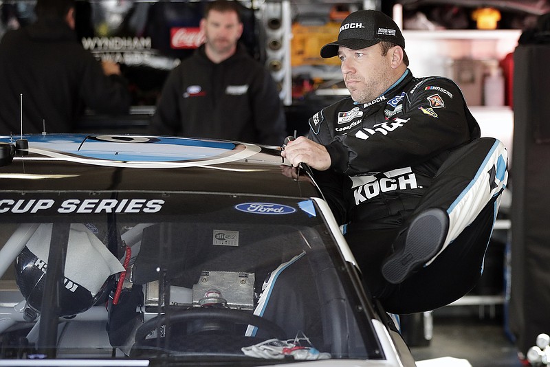 AP photo by John Raoux / Ryan Newman climbs into his car for a NASCAR Cup Series practice session on Feb. 8 at Daytona International Speedway.