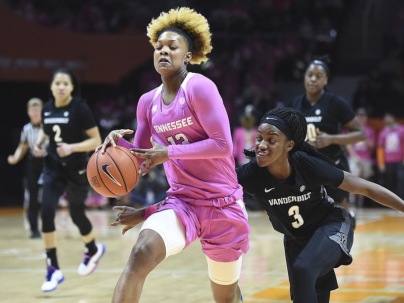 AP photo by Saul Young / Tennessee guard Jazmine Massengill tries to protect the basketball from Vanderbilt's Jordyn Cambridge during Sunday's game in Knoxville. Massengill, from Chattanooga's Hamilton Heights Christian Academy, had three assists and two blocks as the Lady Vols won 67-63.