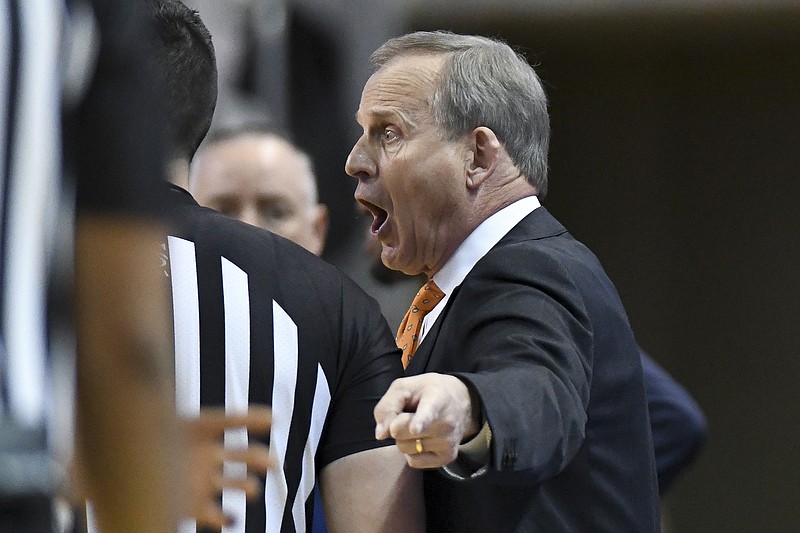 AP photo by Julie Bennett / Tennessee men's basketball coach Rick Barnes talks to game officials after a technical foul was called during the first half of Saturday's SEC matchup at Auburn.