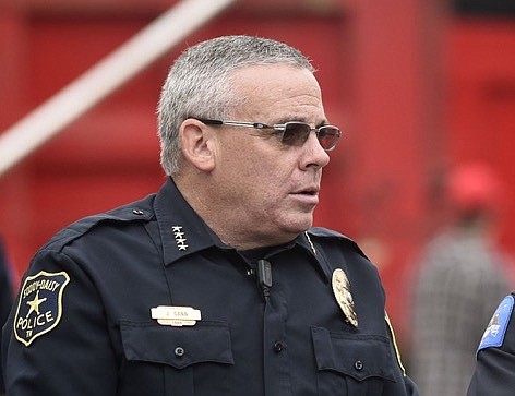 From left, Soddy-Daisy Police Chief Jeff Gann and Chattanooga Chief of Police David Roddy observe the situation along East 4th Street.  President Donald Trump visited the McKenzie Arena on the campus of UTC on November 4, 2018. 