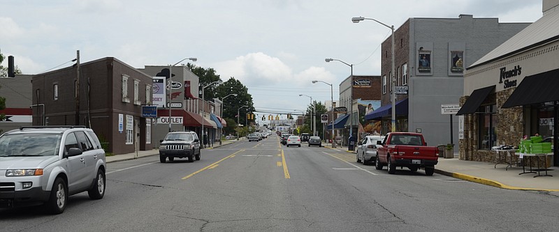 Traffic moves through downtown Crossville / Staff file photo 