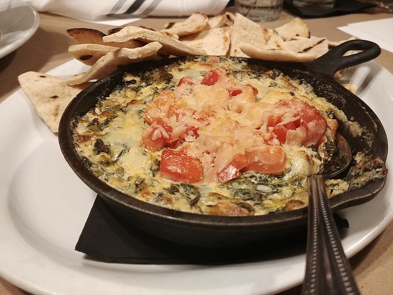 Staff Photo by Jennifer Bardoner / The spinach and arthichoke cheese dip at Food Works has a full, rich flavor.