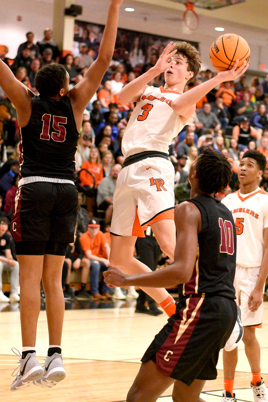 Staff Photo by Robin Rudd / LaFayette's Aidan Hadaway (3) scores from the paint. The LaFayette Ramblers hosted the Cross Creek Razorbacks in the quarterfinals of the GHSA boys state basketball tournament on February 25, 2020.
