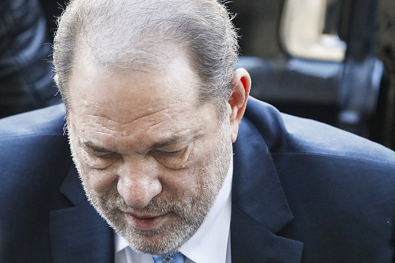 Harvey Weinstein arrives at a Manhattan courthouse for his rape trial, Monday, Feb. 24, 2020, in New York. A jury convicted the Hollywood mogul of rape and sexual assault. The jury found him not guilty of the most serious charge, predatory sexual assault, which could have resulted in a life sentence.(AP Photo/John Minchillo)