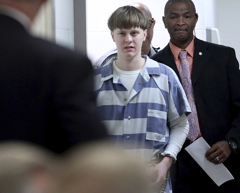 FILE - In this Monday, April 10, 2017 file photo, Dylann Roof arrives to a courtroom at the Charleston County Judicial Center in Charleston, S.C., to enter his guilty plea on murder charges. The white supremacist church shooter staged a hunger strike in February 2020 while on federal death row, alleging in letters to The Associated Press that he's been "targeted by staff," "verbally harassed and abused without cause" and "treated disproportionately harsh." (Grace Beahm/The Post And Courier via AP, Pool, File)


