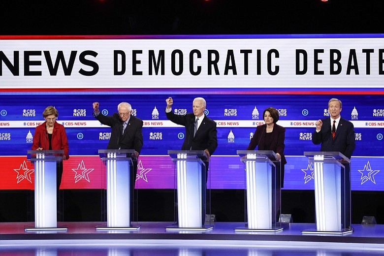 From left, Sen. Elizabeth Warren, D-Mass., Sen. Bernie Sanders, I-Vt., former Vice President Joe Biden, Sen. Amy Klobuchar, D-Minn., and businessman Tom Steyer, participate in a Democratic presidential primary debate at the Gaillard Center, Tuesday, Feb. 25, 2020, in Charleston, S.C., co-hosted by CBS News and the Congressional Black Caucus Institute. (AP Photo/Patrick Semansky)