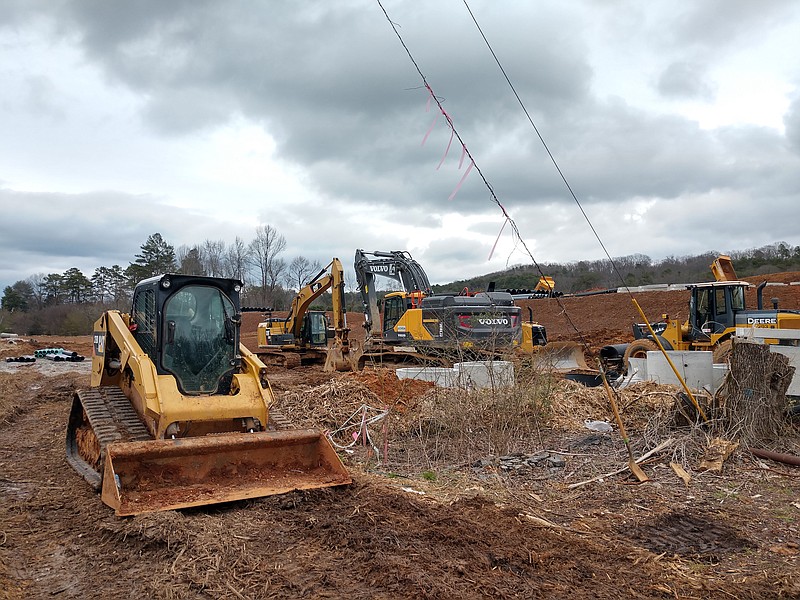 Staff photo by Mike Pare / Work on a housing development is underway at Dayton Boulevard and Mimosa Drive.