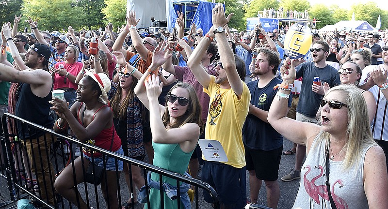 The crowd reacts as Brandon ҔazӠNiederauer and his band finish their set.  Macklemore was the featured act on the final night of the 2019 Riverbend Festival on June 1, 2019.  