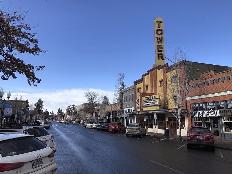 This Jan. 28, 2020 photo shows the Tower theatre located in downtown Bend, Ore., where the population in the early 1990's was around 25,000 and leaned Republican. Demographic shifts are helping push the Republican Party into a nosedive along the West Coast. The last Republican presidential candidate that California went for was George H.W. Bush. For Oregon and Washington, it was Ronald Reagan. Now, Republicans in the three states are even struggling to hold seats in Congress, statehouses and city councils. (AP Photo/Andrew Selsky)


