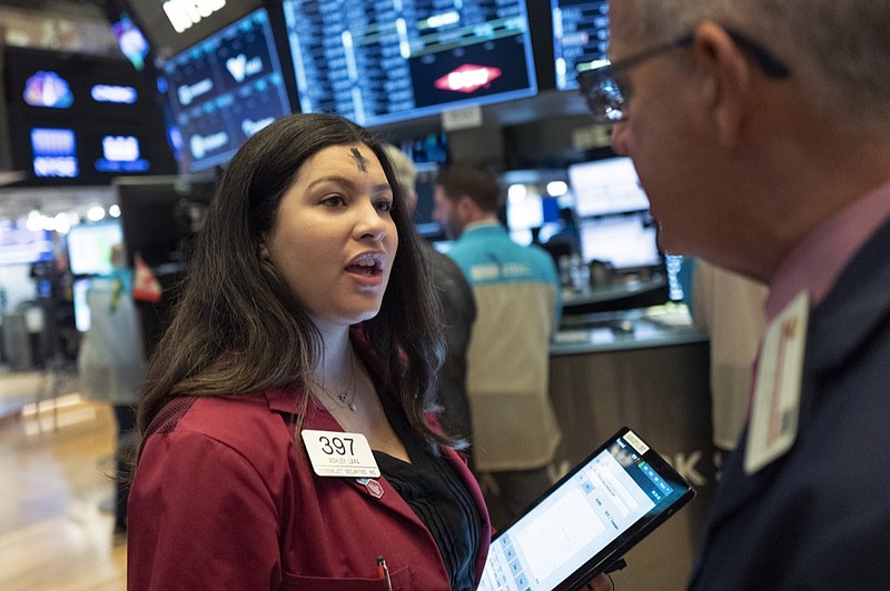 Stock trader Ashley Lara works at the New York Stock Exchange, Wednesday, Feb. 26, 2020. (AP Photo/Mark Lennihan)


