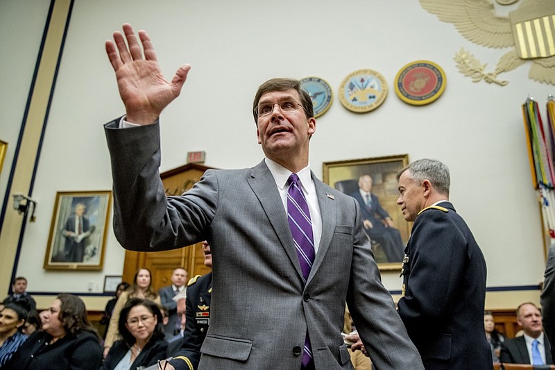 Defense Secretary Mark Esper arrives for a House Armed Services Committee hearing on Capitol Hill, Wednesday, Feb. 26, 2020, in Washington. (AP Photo/Andrew Harnik)