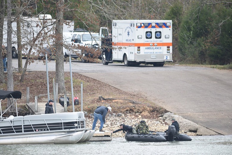 In this 2018 staff file photo, a search and rescue inflatable returns to the ramp at the Possum Creek ramp on Chickamauga Lake as others search for wreckage from a plane crash near Soddy-Daisy. / Staff file photo by Tim Barber