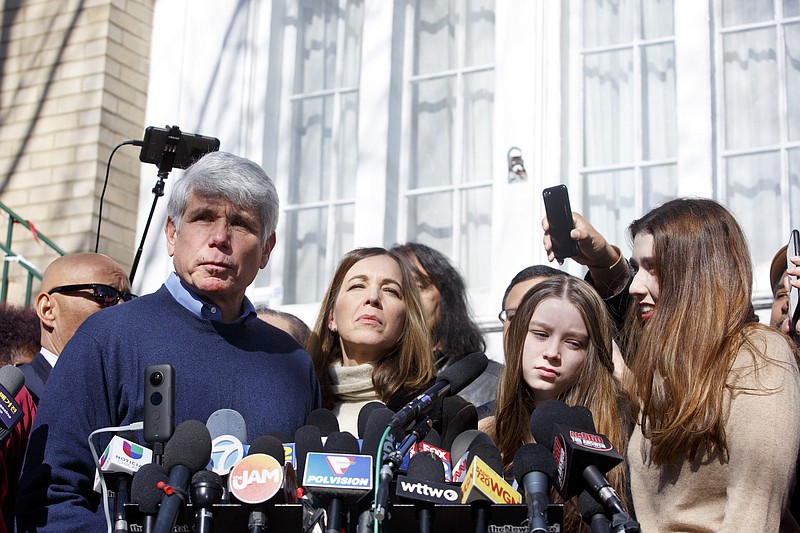 Photo by Laura McDermott of The New York Times / Former Illinois Gov. Rod Blagojevich and his family talk with reporters outside his Chicago home on Wednesday, Feb. 19, 2020.