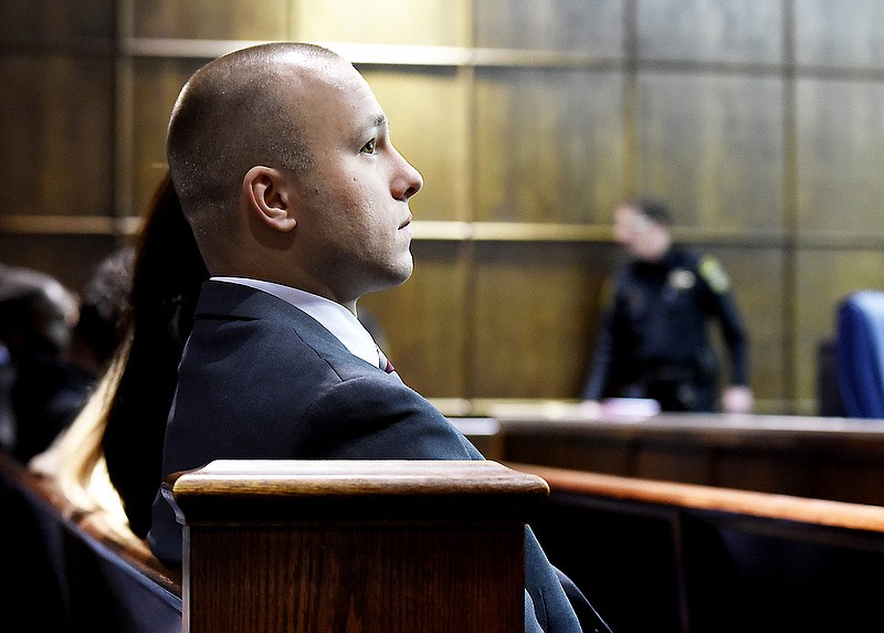 Staff photo by Tim Barber/ Daniel Wilkey, HSCO deputy, waits to get a new Jan. 24, 2020, court date Friday morning in Judge Barry Steelman's courtroom, Dec. 20, 2019.