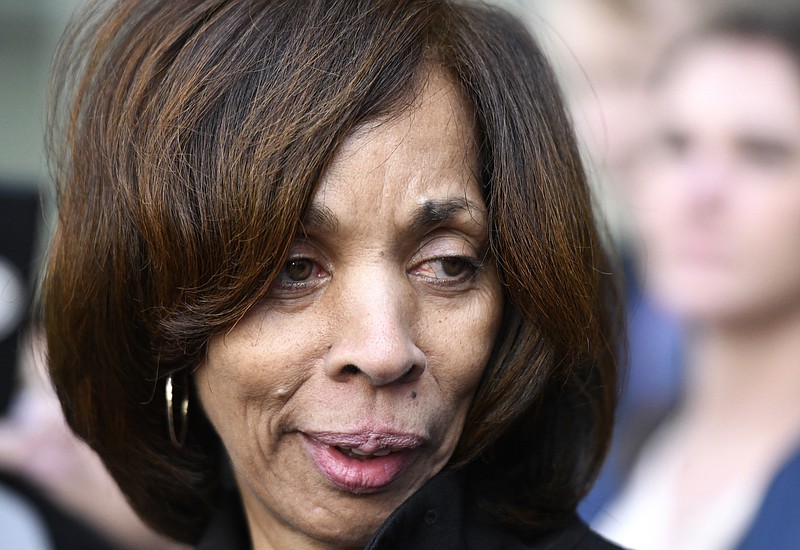 Former Baltimore Mayor Catherine Pugh leaves her sentencing hearing at U.S. District Court in Baltimore on Thursday, Feb. 27, 2020. Pugh was sentenced to three years in federal prison for arranging fraudulent sales of her self-published children's books to nonprofits and foundations to promote her political career. (AP Photo/Steve Ruark)