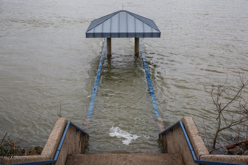 Staff photo by Doug Strickland / The Tennessee River overtakes a pier at the Tennessee Riverpark on Thursday, Jan. 24, 2019, in Chattanooga, Tenn. Heavy rainfall throughout the week brought localized flooding to parts of the Tennessee valley.