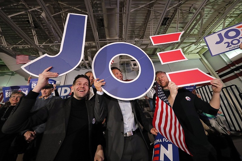 Supporters cheer at a primary election night rally for Democratic presidential candidate former Vice President Joe Biden in Columbia, S.C., Saturday, Feb. 29, 2020. (AP Photo/Gerald Herbert)