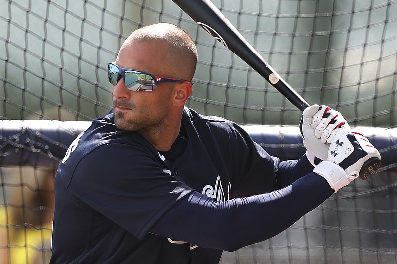 AP photo by Curtis Compton / Atlanta Braves outfielder Nick Markakis takes batting practice Feb. 18 at the team's spring training facility in North Port, Fla.