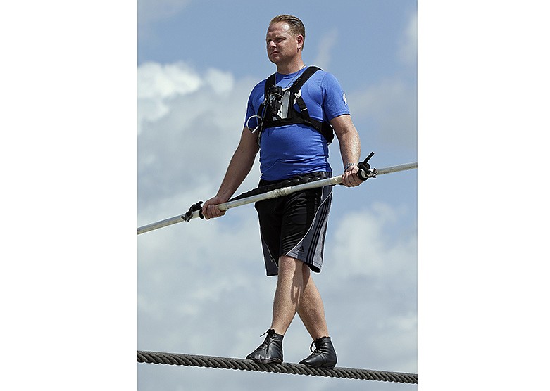 In this June 18, 2013, file photo, high wire performer Nik Wallenda practices in Sarasota, Fla. Wallenda will traverse the Masaya Volcano in Nicaragua on Wednesday, March 4, 2020. (AP Photo/Chris O'Meara, File)