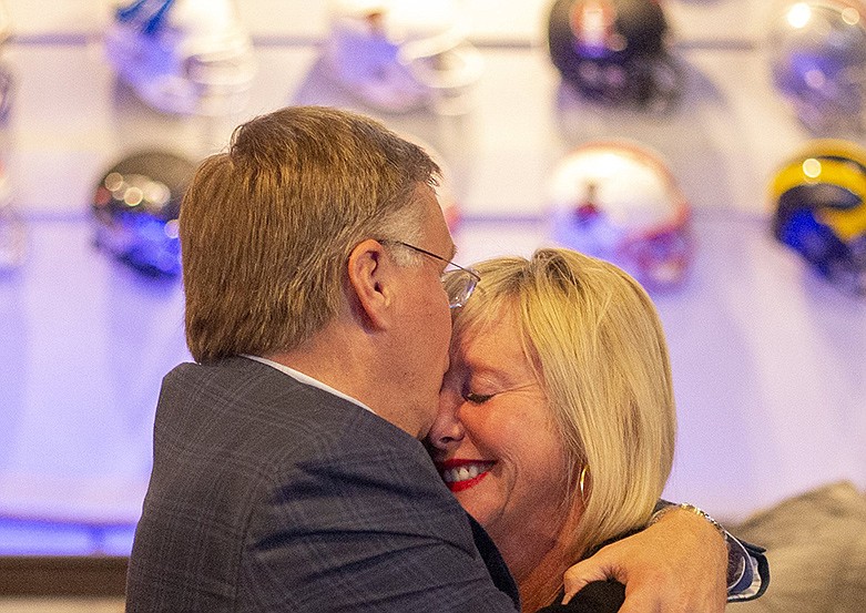 Marty Haynes hugs his fiancee Rep. Esther Helton during an election night party at FreightWaves on Tuesday, March 3, 2020, in Chattanooga, Tenn. / Staff photo by C.B. Schmelter