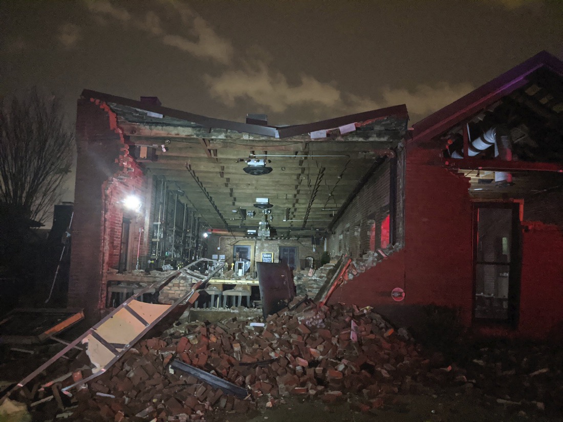 The Geist restaurant brick wall collapsed in a tornado that touched down in downtown Nashville, Tuesday, March 3, 2020. (Alex Carlson via AP)