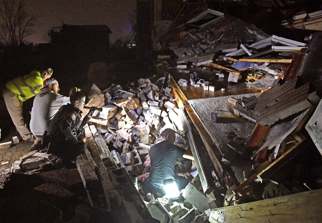 Rescue workers work to free Bill and Shirley Wallace from their Barrett Dr home that collapsed on them trapping them under rubble. Shirley was taken for medical attention after a tornado ripped through neighborhoods in Mt. Juliet, Tenn. Tuesday, March 3, 2020.