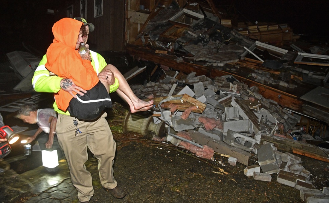 A rescue worker carries Shirley Wallace from her Barrett Dr home that collapsed on her trapping her under rubble. She was taken for medical attention after a tornado ripped through neighborhoods in Mt. Juliet, Tenn. Tuesday, March 3, 2020.