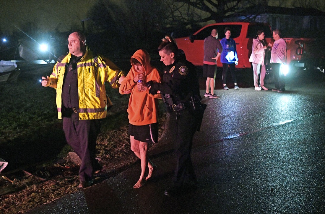 Rescue workers escort Shirley Wallace from her Barrett Dr home that collapsed on her trapping her under rubble. Shirley was taken for medical attention after a tornado ripped through neighborhoods in Mt. Juliet, Tenn. Tuesday, March 3, 2020.