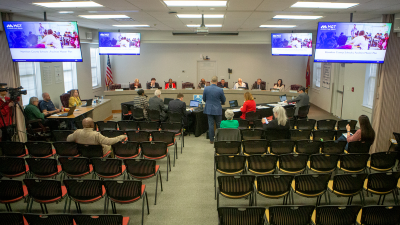 Staff photo by C.B. Schmelter / Mike Raisor, senior vice president of MGT Consulting Group, presents to members of the school board during a work session in the Hamilton County Schools board room on Tuesday, March 3, 2020 in Chattanooga, Tenn. MGT Consulting Group presented the final version of their 10-year, three phase facilities plan.
