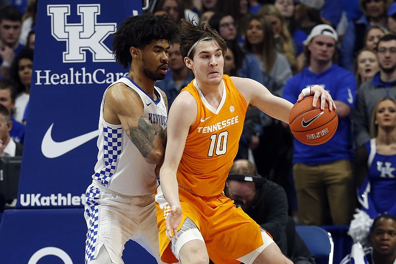 AP photo by James Crisp / Tennessee redshirt junior forward John Fulkerson backs up Kentucky's Nick Richards during the first half of Tuesday night's game in Lexington, Ky.