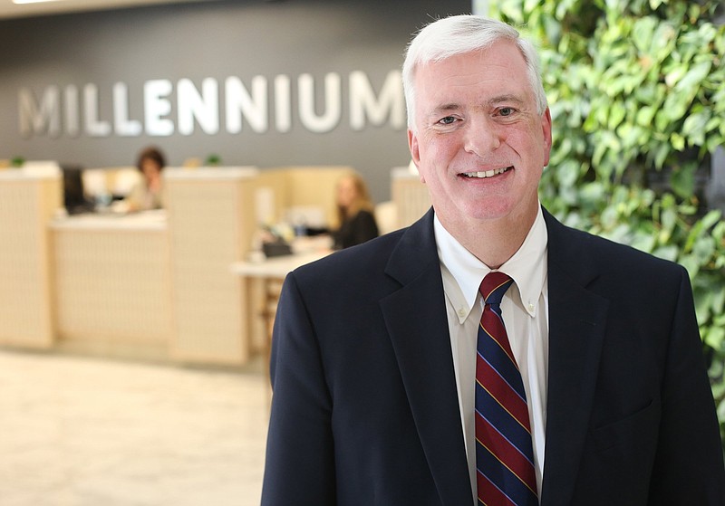 Staff photo by Erin O. Smith / Mike Haskew, president of Millennium Bank, poses for a photo Thursday, September 26, 2019 at the downtown branch of Millennium Bank in Chattanooga, Tennessee. 
