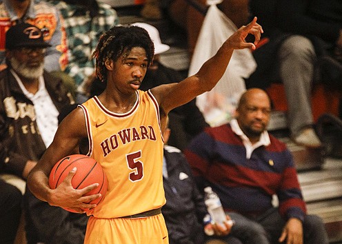 Staff photo by Troy Stolt / Howard's Kerrick Thorne (5) calls a play during the Region 3-AA boys basketball championship game between Tyner and Howard at East Ridge high school on Thursday, March 5, 2020 in Chattanooga, Tenn.