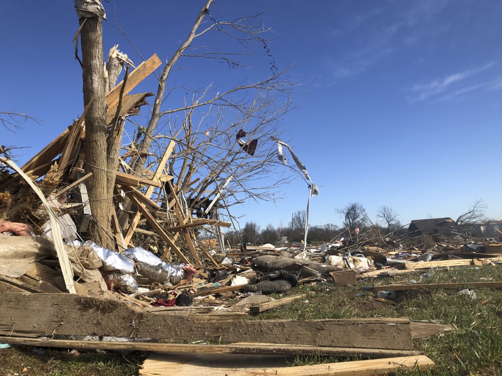 A subdivision near McBroom Chapel Road in Putnam County, Tennessee, was almost completely destroyed by a tornado that blew through on Tuesday morning, March 3, 2020 before dawn. On Wednesday, volunteers cut damaged tress and sorted debris. (AP Photo/Travis Loller)