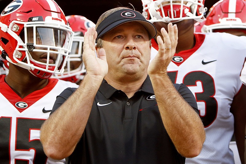Staff file photo by C.B. Schmelter / Georgia football coach Kirby Smart and the Bulldogs have received three commitments for the 2021 signing class, all of them from high school players in the Peach State.