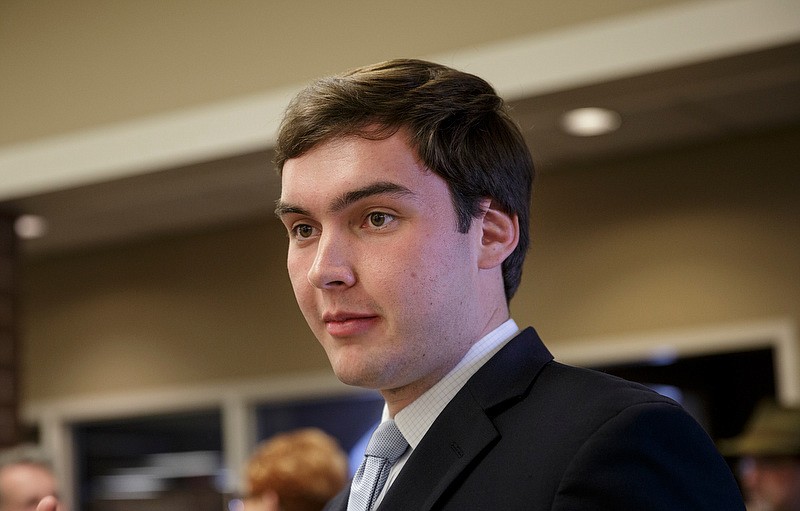 Staff photo by Doug Strickland / Georgia State House District 1 candidate Colton Moore talks with people before a debate at Dade County Public Library on Thursday, April 19, 2018, in Trenton, Ga. Multiple candidates across several races were in attendance for the forum, which precedes the May 22 primary election.