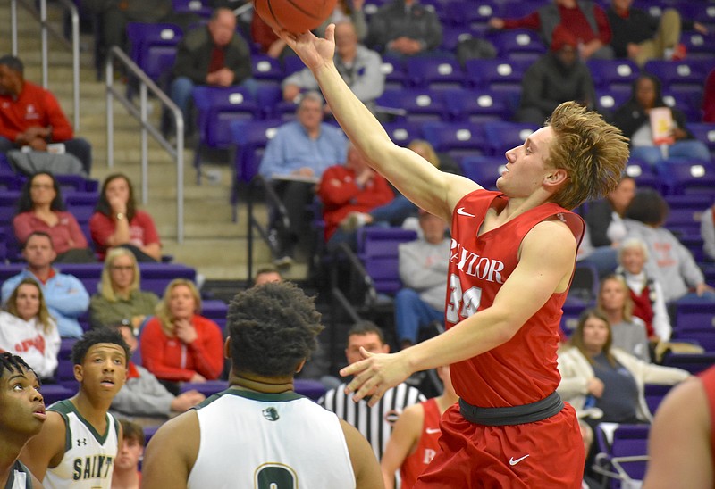 Staff photo by Patrick MacCoon / Baylor senior Gehrig Ebel drives to the basket during Friday's loss to Briarcrest Christian in a TSSAA Division II-AA state semifinal at Lipscomb University in Nashville.

