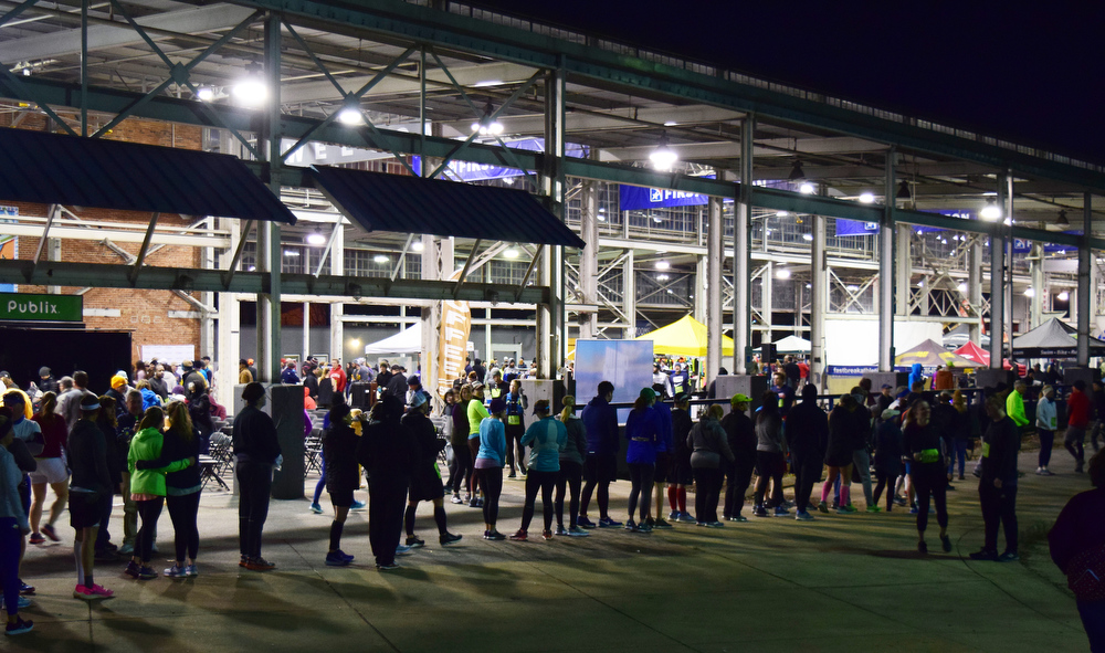 Staff Photo by Robin Rudd / Runners and spectators fills the First Tennessee Pavilion before the race. The 5th Erlanger Chattanooga Marathon was run on March 8, 2020.