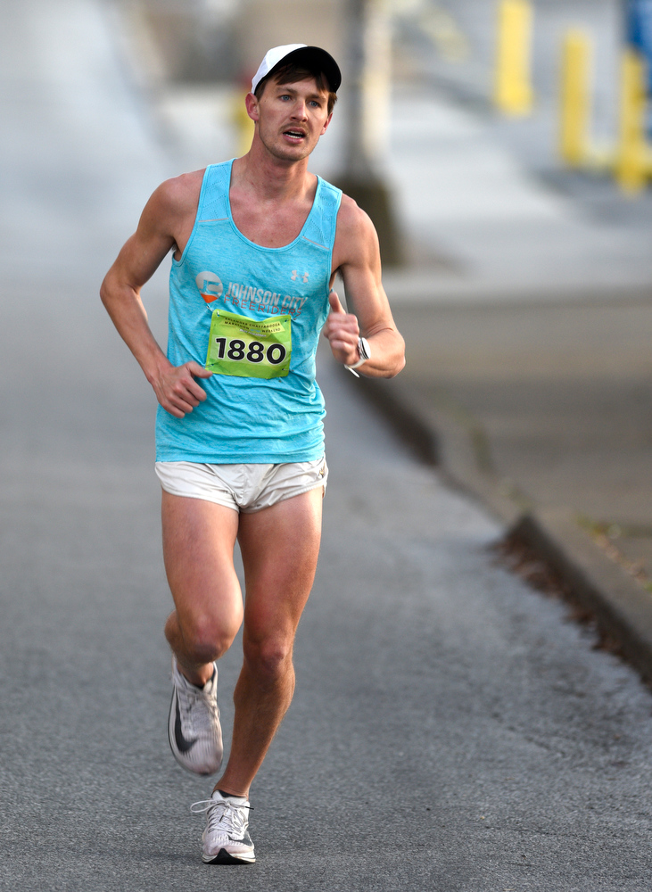 Staff Photo by Robin Rudd / Brandon Ellis makes his way down Lindsey Street. Ellis would go on to win the half marathon with a time of 1:10:50. The 5th Erlanger Chattanooga Marathon was run on March 8, 2020.