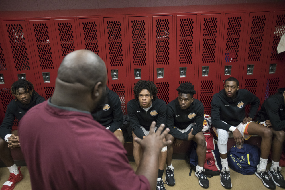 Staff photo by Troy Stolt / Howard Head Coach James Talley speaks to his team before the beginning of the boys' Class AA basketball sectional championship game between Upperman and Howard on Monday, March 9, 2020 in Chattanooga, Tenn. Upperman would win the game and advance to the state tournament.