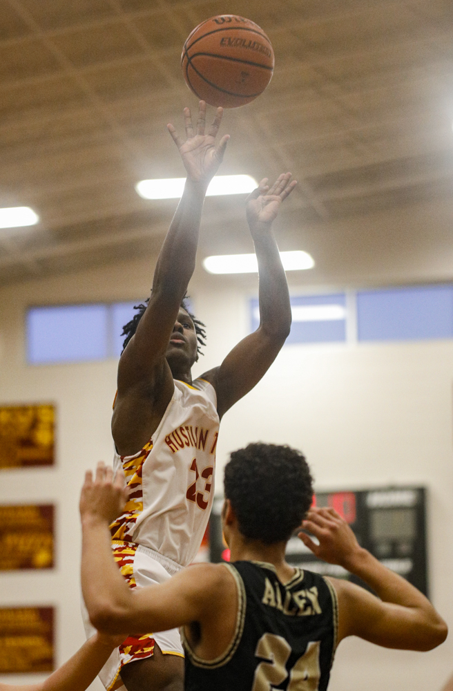 Staff photo by Troy Stolt / Howard's Calvin James (23) shoots the ball during the boys' Class AA basketball sectional championship game between Upperman and Howard on Monday, March 9, 2020 in Chattanooga, Tenn. Upperman would win the game and advance to the state tournament.