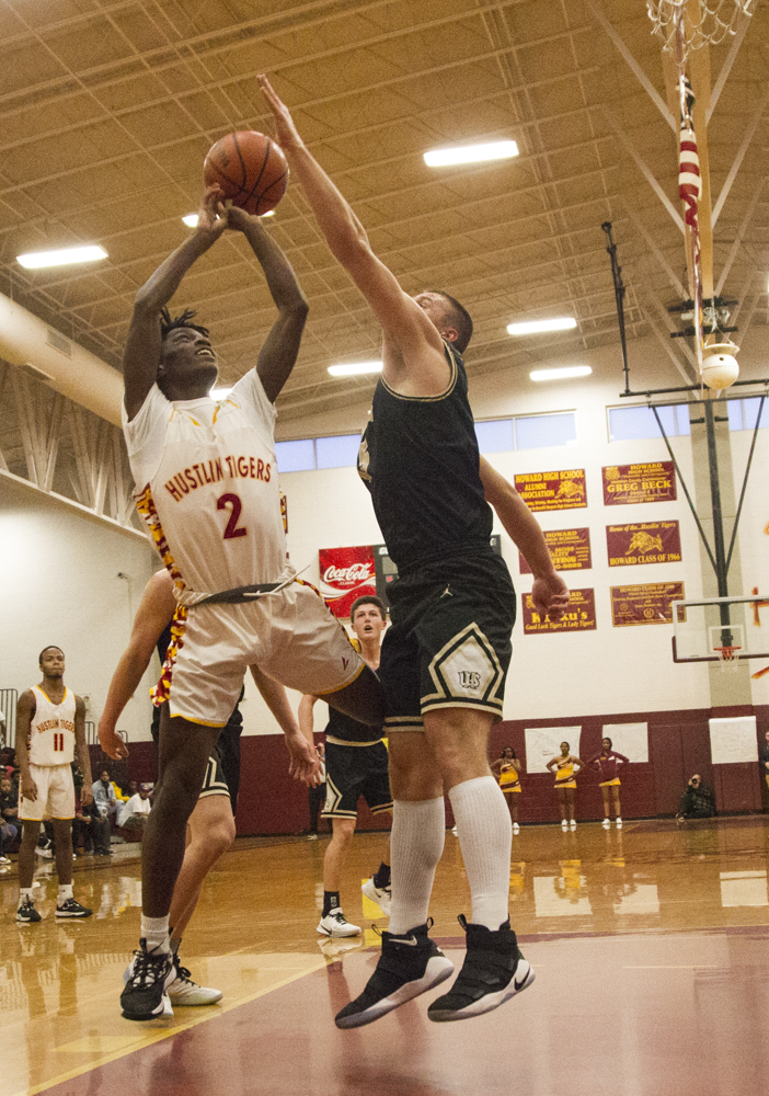 Staff photo by Troy Stolt / Howard's Jaylen Sexton (2) shoots the ball during the boys' Class AA basketball sectional championship game between Upperman and Howard on Monday, March 9, 2020 in Chattanooga, Tenn. Upperman would win the game and advance to the state tournament.